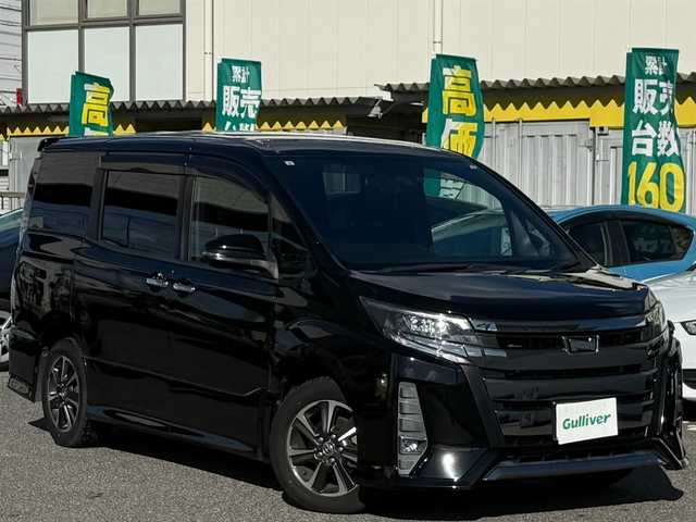 トヨタ ノア Si ダブルバイビー 愛知県 2017(平29)年 5.3万km ブラック /純正9インチSDナビ//純正フルセグTV//AM/FM/CD/DVD/SD/BT//バックカメラ//ビルトインETC//純正ドライブレコーダー//純正フリップダウン後席モニター//横滑り防止装置//ヒルスタートアシストコントロール//Toyota Safety Sense C//オートハイビーム//衝突被害軽減ブレーキ//レーンアシスト//先行発進告知機能//クルーズコントロール//ECO MODE//ステアスイッチ//純正16インチアルミホイール//純正LEDオートライト//フロントフォグランプ//両側パワースライドドア//バックドアイージークローザー//オートリトラミラー//シートバックテーブル//サイドテーブル//ISOFIX//後席用サンシェード//ダブルエアバック//スマートキー//スペアキー1本//取扱説明書//ナビ説明書//保証書//記録簿(R2/R4/R6)