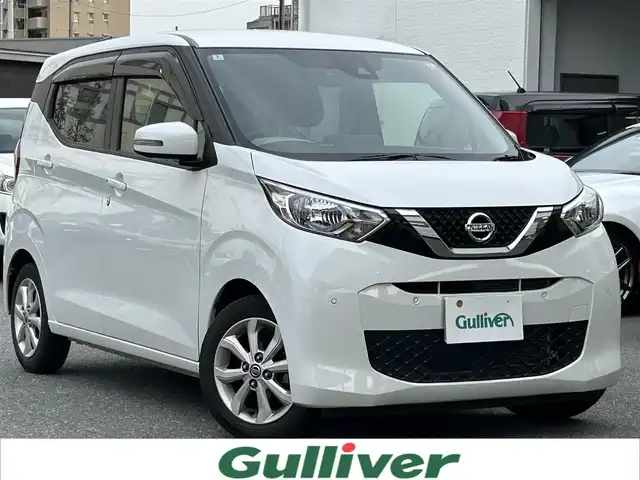 日産 デイズ X 福岡県 2022(令4)年 5.7万km ホワイトパール ワンオーナー/禁煙車/純正ディーラーナビ/（Bluetooth・フルセグ・DVD・CD・ラジオ）/アラウンドビューモニター/クリアランスソナー/アイドリングストップ/ＥＴＣ/ウィンカーミラー/オートライト/オートエアコン/純正フロアマット/純正アルミホイール/ドアバイザー/プッシュスタート/取扱説明書/保証書