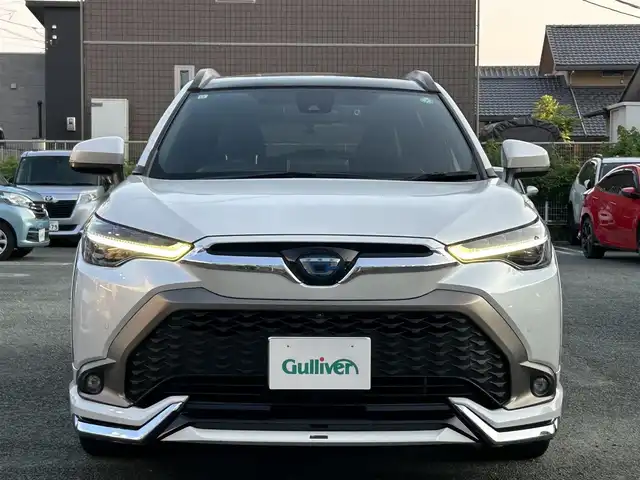 トヨタ カローラ クロス ハイブリッド Z 熊本県 2021(令3)年 3.7万km プラチナホワイトパールマイカ モデリスタエアロ/モデリスタ18インチAW/スカイルーフ/ワンオーナー/衝突軽減ブレーキ/レーンキープアシスト/プッシュスタート/純正ナビ/（フルセグTV・BTオーディオ）/全方位カメラ/ビルトインETC/前後ドライブレコーダー/レーダークルーズ/パワーバックドア/ルーフレール/右前席パワーシート/前席シートヒーター/LEDヘッドライト/オートライト/フォグライト/前後コーナーセンサー/横滑り防止装置/ウィンカーミラー/純正フロアマット/純正ドアバイザー/新車保証書/取扱説明書/スマートスペアキー×1本