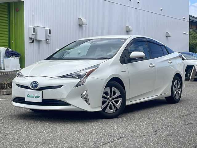 トヨタ プリウス A 福井県 2016(平28)年 11.6万km ホワイトパールクリスタルシャイン ワンオーナー /社外メモリナビゲーション/（CD/DVD）/バックカメラ/ワンセグテレビ/プリクラッシュセーフティ/レーンキープアシスト/アダプティブクルーズコントロール/ヘッドアップディスプレイ/パーキングアシスト/ブラインドスポットモニター/クリアランスソナー /純正15インチアルミホイール/オートリトラミラー /オートハイビーム/LEDヘッドライト/LEDフォグランプ/オートライト/ETC/ステアリングリモコン/プッシュスタート/スマートキー/保証書/取扱説明書