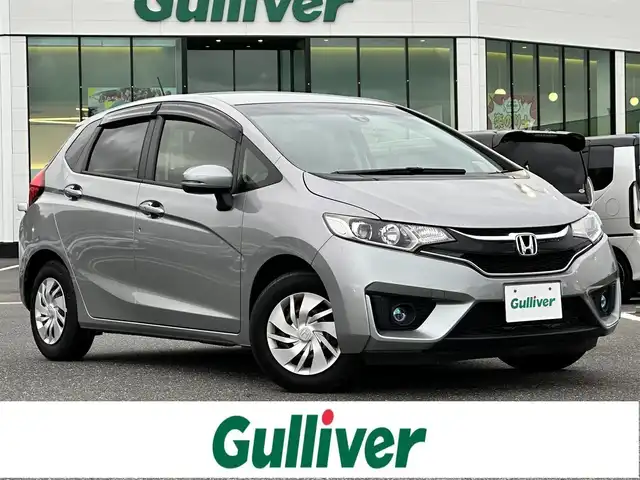 ホンダ フィット 13G Lパッケージ 島根県 2015(平27)年 3.4万km ティンテッドシルバーM 登録時走行距離33/310Km/ワンオーナー/プッシュスタート/社外デジタルインナーミラー/ウィンカーミラー/クルーズコントロール/純正ドアバイザー/オートライト/純正フロアマット/スマートキー/スペアキー×1