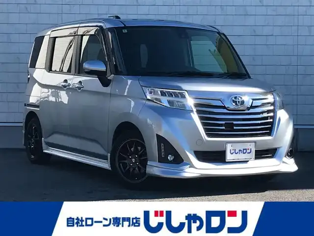 トヨタ ルーミー カスタムG－T 栃木県 2018(平30)年 11.3万km ブライトシルバーM (株)IDOMが運営する【じしゃロン小山店】の自社ローン対象車両になります。こちらは現金ご利用時の価格です。/自社ローンご希望の方は別途その旨お申付け下さい。//ワンオーナー/禁煙車/純正ワンセグナビ/（CD/AM/FMラジオ）/(Bluetooth)/スマートキー/プッシュスタート/バックカメラ/ＥＴＣ/両側パワースライドドア/車線逸脱警報/プリクラッシュセーフティ/クルーズコントロール/コーナーセンサー/後部座席サンシェード/アイドリングストップ/ステアリングリモコン/電動格納ドアミラー/パワーウインドウ/オートライト/防眩ミラー