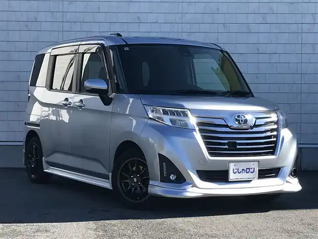 トヨタ ルーミー カスタムG－T 栃木県 2018(平30)年 11.3万km ブライトシルバーM (株)IDOMが運営する【じしゃロン小山店】の自社ローン対象車両になります。こちらは現金ご利用時の価格です。/自社ローンご希望の方は別途その旨お申付け下さい。//ワンオーナー/禁煙車/純正ワンセグナビ/（CD/AM/FMラジオ）/(Bluetooth)/スマートキー/プッシュスタート/バックカメラ/ＥＴＣ/両側パワースライドドア/車線逸脱警報/プリクラッシュセーフティ/クルーズコントロール/コーナーセンサー/後部座席サンシェード/アイドリングストップ/ステアリングリモコン/電動格納ドアミラー/パワーウインドウ/オートライト/防眩ミラー