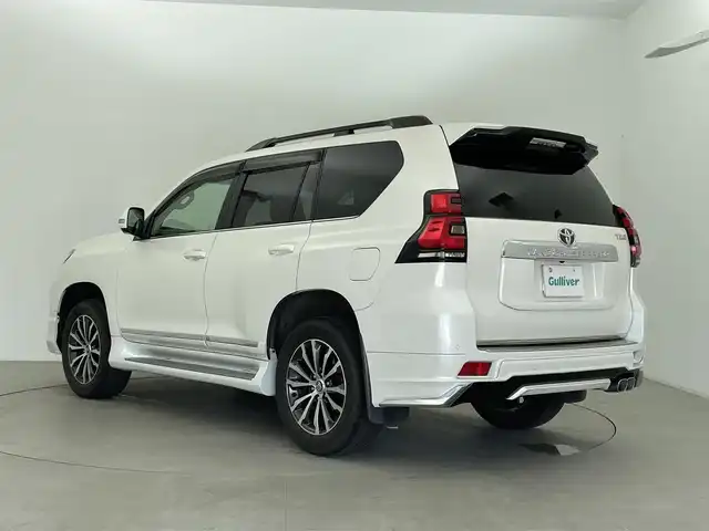 トヨタ ランドクルーザー プラド TZ－G 富山県 2020(令2)年 8.4万km ホワイトパールクリスタルシャイン 4WD/7人乗り/モデリスタエアロ/サンルーフ/純正ナビ（FM/AM/BT）/AppleCarPlay/AndroidAuto/フルセグTV/全方位カメラ/レーダークルーズコントロール/本革シート/前席パワーシート/D席シートメモリー/前席エアシート/ビルトインETC2.0/前後ドライブレコーダー/スマートキー/スペアキー1本/プッシュスタート/レーンキープアシスト/衝突被害軽減システム/BSM/前後コーナーセンサー/センターデフロック/ダウンヒルアシストコントロール/純正フロアマット/ラゲッジマット/パドルシフト/純正19インチAW