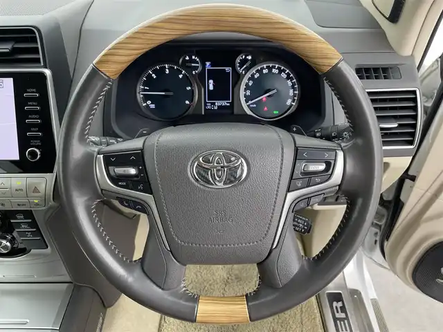 トヨタ ランドクルーザー プラド TZ－G 富山県 2020(令2)年 8.4万km ホワイトパールクリスタルシャイン 4WD/7人乗り/モデリスタエアロ/サンルーフ/純正ナビ（FM/AM/BT）/AppleCarPlay/AndroidAuto/フルセグTV/全方位カメラ/レーダークルーズコントロール/本革シート/前席パワーシート/D席シートメモリー/前席エアシート/ビルトインETC2.0/前後ドライブレコーダー/スマートキー/スペアキー1本/プッシュスタート/レーンキープアシスト/衝突被害軽減システム/BSM/前後コーナーセンサー/センターデフロック/ダウンヒルアシストコントロール/純正フロアマット/ラゲッジマット/パドルシフト/純正19インチAW