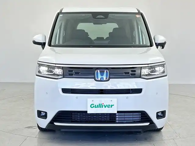 ホンダ ステップワゴン eHEV エアー EX 愛知県 2025(令7)年 0.1千km パール 登録済未使用車/純正ナビ/・フルセグ/・Bluetooth/・Apple Car Play/・Android Auto/・CD/・DVD/両側パワースライドドア/前席シートヒーター/バックカメラ/追従型クルコン/レーンキープアシスト/衝突軽減ブレーキ/コーナーセンサー/盗難防止装置/横滑り防止装置/純正アルミホイール/LEDヘッドライト/スマートキー/スペアキー/保証書/取扱説明書