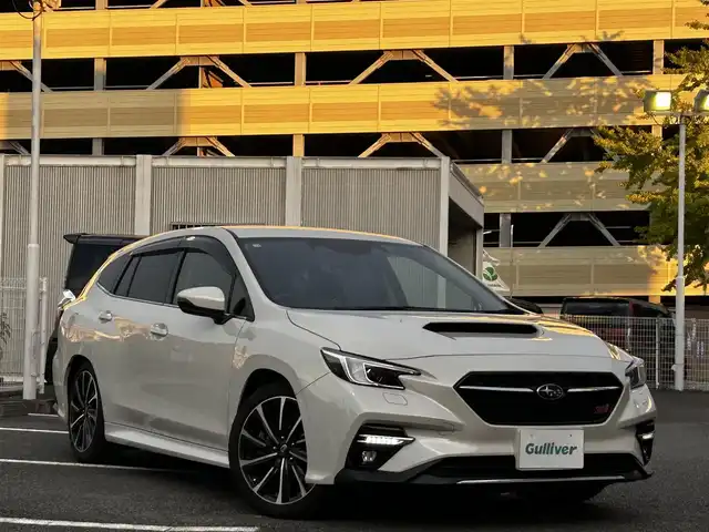 スバル レヴォーグ 1．8STIスポーツ EX 静岡県 2020(令2)年 5.7万km クリスタルホワイトP ユーザー買取車両/法人ワンオーナー/純正ナビ/【AM/FM/BT/TV】/純正18インチAW/純正LEDヘッドライト/デジタルインナーミラー/4WD/MTモード付AT/アイドリンクストップ/スマートキー/スペアキー×１/クルーズコントロール（追従走行あり）/USB入力端子/ETC/車外カメラ（バック/左サイド）/電動理アゲート/ドライブレコーダー/レザーシート/パワーシート/シートヒーター/純正エアロパーツ（フロント/リア）/横滑り防止装置/レーンアシスト/衝撃被害軽減システム/保証書/取扱説明書