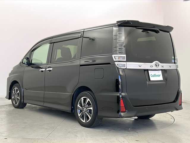 トヨタ ヴォクシー ZS 煌Ⅱ 宮城県 2019(平31)年 7.1万km ブラック Toyota Safety Sense /・プリクラッシュセーフティ/・レーンディパーチャーアラート/・オートマチックハイビーム/ALPINE製10インチフリップダウンモニター/【RSH10S-L】/クルーズコントロール/ALPINE製9インチナビ/・BT.CD.DVD.SD.USB.HDMI/バックカメラ/フルセグTV/両側パワースライドドア/ETC/プッシュスタート/スマートキー×２/ステアリングスイッチ/LEDヘッドライト/LEDフォグライト/純正フロアマット/純正16インチAW/純正ドアバイザー/ロールサンシェード/シートバックテーブル