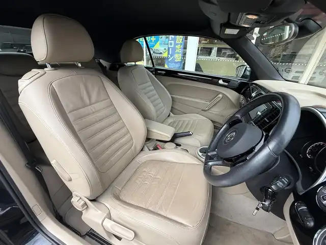 フォルクスワーゲン ザ・ビートル カブリオレ 長崎県 2014(平26)年 10.5万km 黒 登録時104120km/純正ナビ/・TV/・DVD/・Bluetooth/バックカメラ/D＋N席シートヒーター/オートヘッドライト/オープンカー/電動格納ミラー/MT付きAT