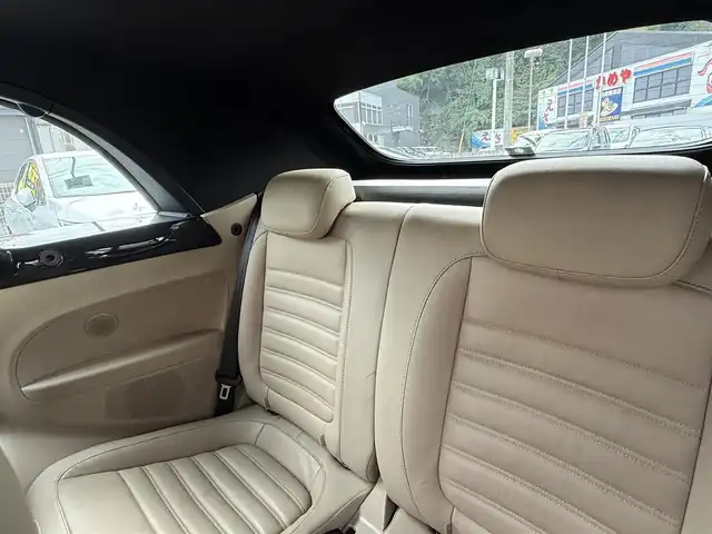 フォルクスワーゲン ザ・ビートル カブリオレ 長崎県 2014(平26)年 10.5万km 黒 登録時104120km/純正ナビ/・TV/・DVD/・Bluetooth/バックカメラ/D＋N席シートヒーター/オートヘッドライト/オープンカー/電動格納ミラー/MT付きAT