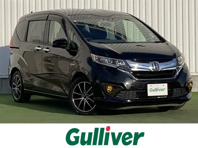 ホンダ フリード ハイブリット G ホンダセンシング 香川県 2016(平28)年 7.9万km クリスタルブラックパール パナソニック7型ナビ(CN-RX03D)/→AM/FM/フルセグTV/Bluetooth/CD/DVD/ホンダセンシング/・衝突軽減ブレーキ/・誤発進抑制機能/・歩行者事故低減ステアリング/・路外逸脱抑制機能/・渋滞追従機能付アダプティブ・クルーズ・コントロール/・車線維持支援システム/・オートハイビーム/バックカメラ/両側パワースライドドア/LEDヘッドライト/社外LEDフォグランプ/オートライト/前後ドライブレコーダー/ETC/社外16インチAW（SPORT KRONE）/電動格納ウィンカーミラー/アイドリングストップ/横滑り防止装置/パワーウィンドウ/オートエアコン/プッシュスタート/スマートキー