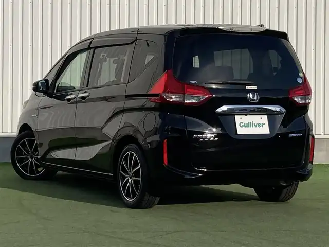 ホンダ フリード ハイブリット G ホンダセンシング 香川県 2016(平28)年 7.9万km クリスタルブラックパール パナソニック7型ナビ(CN-RX03D)/→AM/FM/フルセグTV/Bluetooth/CD/DVD/ホンダセンシング/・衝突軽減ブレーキ/・誤発進抑制機能/・歩行者事故低減ステアリング/・路外逸脱抑制機能/・渋滞追従機能付アダプティブ・クルーズ・コントロール/・車線維持支援システム/・オートハイビーム/バックカメラ/両側パワースライドドア/LEDヘッドライト/社外LEDフォグランプ/オートライト/前後ドライブレコーダー/ETC/社外16インチAW（SPORT KRONE）/電動格納ウィンカーミラー/アイドリングストップ/横滑り防止装置/パワーウィンドウ/オートエアコン/プッシュスタート/スマートキー