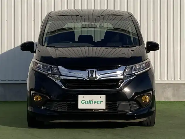ホンダ フリード ハイブリット G ホンダセンシング 香川県 2016(平28)年 7.9万km クリスタルブラックパール パナソニック7型ナビ(CN-RX03D)/→AM/FM/フルセグTV/Bluetooth/CD/DVD/ホンダセンシング/・衝突軽減ブレーキ/・誤発進抑制機能/・歩行者事故低減ステアリング/・路外逸脱抑制機能/・渋滞追従機能付アダプティブ・クルーズ・コントロール/・車線維持支援システム/・オートハイビーム/バックカメラ/両側パワースライドドア/LEDヘッドライト/社外LEDフォグランプ/オートライト/前後ドライブレコーダー/ETC/社外16インチAW（SPORT KRONE）/電動格納ウィンカーミラー/アイドリングストップ/横滑り防止装置/パワーウィンドウ/オートエアコン/プッシュスタート/スマートキー