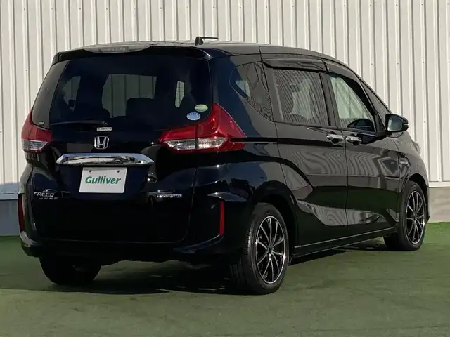 ホンダ フリード ハイブリット G ホンダセンシング 香川県 2016(平28)年 7.9万km クリスタルブラックパール パナソニック7型ナビ(CN-RX03D)/→AM/FM/フルセグTV/Bluetooth/CD/DVD/ホンダセンシング/・衝突軽減ブレーキ/・誤発進抑制機能/・歩行者事故低減ステアリング/・路外逸脱抑制機能/・渋滞追従機能付アダプティブ・クルーズ・コントロール/・車線維持支援システム/・オートハイビーム/バックカメラ/両側パワースライドドア/LEDヘッドライト/社外LEDフォグランプ/オートライト/前後ドライブレコーダー/ETC/社外16インチAW（SPORT KRONE）/電動格納ウィンカーミラー/アイドリングストップ/横滑り防止装置/パワーウィンドウ/オートエアコン/プッシュスタート/スマートキー