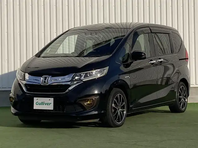 ホンダ フリード ハイブリット G ホンダセンシング 香川県 2016(平28)年 7.9万km クリスタルブラックパール パナソニック7型ナビ(CN-RX03D)/→AM/FM/フルセグTV/Bluetooth/CD/DVD/ホンダセンシング/・衝突軽減ブレーキ/・誤発進抑制機能/・歩行者事故低減ステアリング/・路外逸脱抑制機能/・渋滞追従機能付アダプティブ・クルーズ・コントロール/・車線維持支援システム/・オートハイビーム/バックカメラ/両側パワースライドドア/LEDヘッドライト/社外LEDフォグランプ/オートライト/前後ドライブレコーダー/ETC/社外16インチAW（SPORT KRONE）/電動格納ウィンカーミラー/アイドリングストップ/横滑り防止装置/パワーウィンドウ/オートエアコン/プッシュスタート/スマートキー