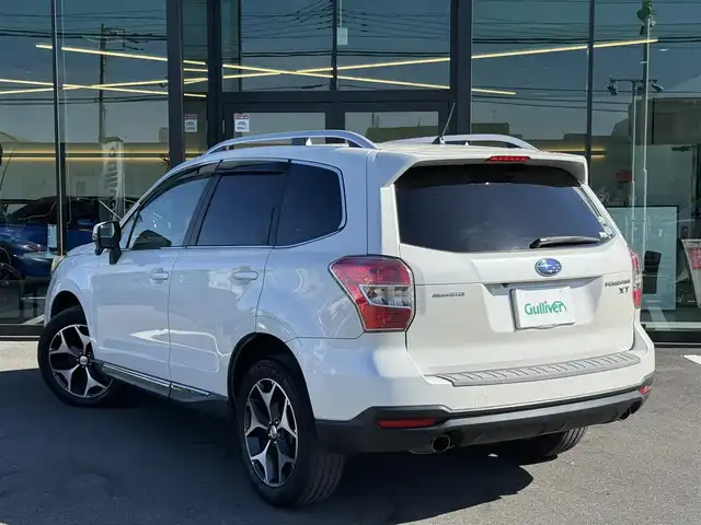 スバル フォレスター 2．0XT アイサイト 栃木県 2014(平26)年 11万km サテンホワイトパール 車検期限令和9年6月23日まで/サンルーフ/社外ナビ/Bluetoothオーディオ/DVD再生機能/フルセグTV走行中視聴可能/バックカメラ/アイサイト/レーダークルーズコントロール/パワーバックドア/ハーフレザーシート/パワーシート/シートヒーター/純正18インチAW/スマートキー×2