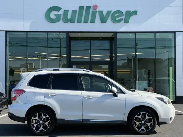 スバル フォレスター 2．0XT アイサイト 栃木県 2014(平26)年 11万km サテンホワイトパール 車検期限令和9年6月23日まで/サンルーフ/社外ナビ/Bluetoothオーディオ/DVD再生機能/フルセグTV走行中視聴可能/バックカメラ/アイサイト/レーダークルーズコントロール/パワーバックドア/ハーフレザーシート/パワーシート/シートヒーター/純正18インチAW/スマートキー×2