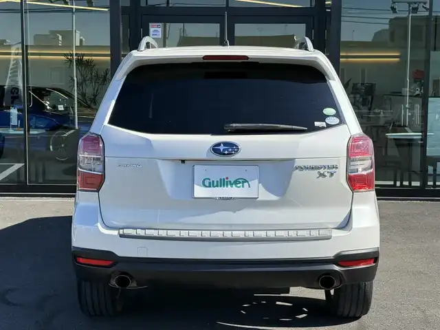 スバル フォレスター 2．0XT アイサイト 栃木県 2014(平26)年 11万km サテンホワイトパール 車検期限令和9年6月23日まで/サンルーフ/社外ナビ/Bluetoothオーディオ/DVD再生機能/フルセグTV走行中視聴可能/バックカメラ/アイサイト/レーダークルーズコントロール/パワーバックドア/ハーフレザーシート/パワーシート/シートヒーター/純正18インチAW/スマートキー×2