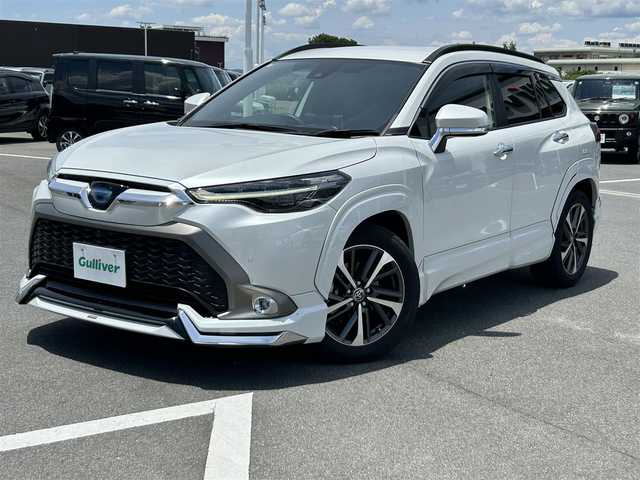 トヨタ カローラ クロス ハイブリッド Z 奈良県 2021(令3)年 3.2万km プラチナホワイトパールマイカ 純正ディスプレイオーディオ　/フルセグテレビ　/テレビキャンセラー/パワーバックドア　/ビルトインＥＴＣ２．０　/オートハイビーム　/全方位モニター　/プリクラッシュセーフティー　/ブラインドスポットモニター　/コーナーセンサー/アダブティブクルーズコントロール/オートハイビーム/パワシート（運転席のみ）/シートヒーター/純正アルミホイール/フルエアロ（フロント・サイド・リア）/LEDフロントライト/取り扱い説明書/保証書/スペアキーあり