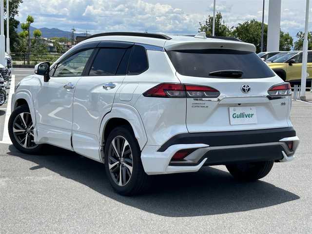 トヨタ カローラ クロス ハイブリッド Z 奈良県 2021(令3)年 3.2万km プラチナホワイトパールマイカ 純正ディスプレイオーディオ　/フルセグテレビ　/テレビキャンセラー/パワーバックドア　/ビルトインＥＴＣ２．０　/オートハイビーム　/全方位モニター　/プリクラッシュセーフティー　/ブラインドスポットモニター　/コーナーセンサー/アダブティブクルーズコントロール/オートハイビーム/パワシート（運転席のみ）/シートヒーター/純正アルミホイール/フルエアロ（フロント・サイド・リア）/LEDフロントライト/取り扱い説明書/保証書/スペアキーあり