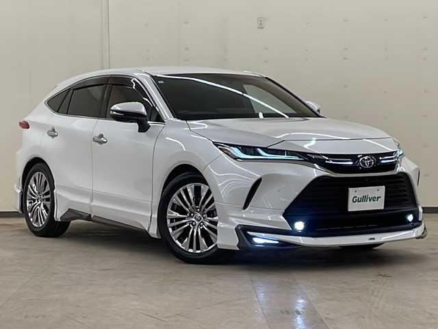 トヨタ ハリアー ハイブリッド Z レザーパッケージ 道央・札幌 2023(令5)年 2.7万km プラチナホワイトパールマイカ /純正ナビ（TV＆BT＆USB＆miacast）//全方位カメラ//寒冷地仕様//革シート//JBL//トヨタセーフティセンス//レーンキープアシスト//レーダークルーズコントロール//衝突被害軽減ブレーキ//ブラインドスポットモニター//クリアランスソナー//レーントレーシングアシスト//リアクロストラフィックアラート//ヘッドアップディスプレイ//ロードサインアシスト//先行車発進告知//オートマチックハイビーム//リアフォグランプ//パワーバックドア//ステアリングヒーター//シートヒーター//エアシート//ビルトインETC2.0//ドアミラーヒーター//LEDヘッドライト//LEDフォグランプ//純正前後ドライブレコーダー//デジタルインナーミラー//モデリスタエアロ//冬タイヤ社外AW積み込み