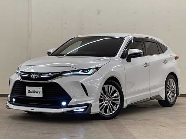 トヨタ ハリアー ハイブリッド Z レザーパッケージ 道央・札幌 2023(令5)年 2.7万km プラチナホワイトパールマイカ /純正ナビ（TV＆BT＆USB＆miacast）//全方位カメラ//寒冷地仕様//革シート//JBL//トヨタセーフティセンス//レーンキープアシスト//レーダークルーズコントロール//衝突被害軽減ブレーキ//ブラインドスポットモニター//クリアランスソナー//レーントレーシングアシスト//リアクロストラフィックアラート//ヘッドアップディスプレイ//ロードサインアシスト//先行車発進告知//オートマチックハイビーム//リアフォグランプ//パワーバックドア//ステアリングヒーター//シートヒーター//エアシート//ビルトインETC2.0//ドアミラーヒーター//LEDヘッドライト//LEDフォグランプ//純正前後ドライブレコーダー//デジタルインナーミラー//モデリスタエアロ//冬タイヤ社外AW積み込み