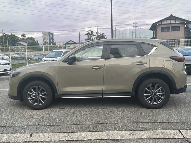 マツダ ＣＸ－５ XD フィールドジャーニー 富山県 2022(令4)年 1万km ジルコンサンドメタリック ４WD/全周囲カメラ/スマートキー/ハーフレザーシート/衝突安全ブレーキ/メーカーOPメモリーナビ/BT接続・フルセグTV/ヘッドアップディスプレイ/ETC２．０/パドルシフト/メモリー付きパワーシート/レーダークルーズコントロール/車線逸脱警報/電格ウィンカーミラー/前後ドラレコ(HF-AHD-2309Y)/パドルシフト/シートヒーター/ステアリングヒーター/保証書・取説・ナビ取説/スペアキー（スマートキー）