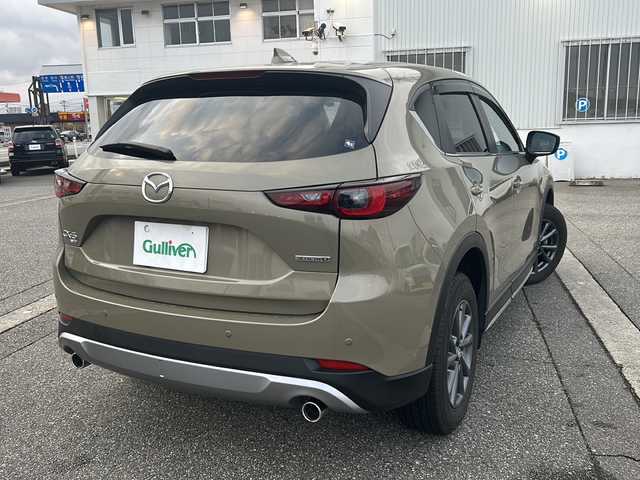 マツダ ＣＸ－５ XD フィールドジャーニー 富山県 2022(令4)年 1万km ジルコンサンドメタリック ４WD/全周囲カメラ/スマートキー/ハーフレザーシート/衝突安全ブレーキ/メーカーOPメモリーナビ/BT接続・フルセグTV/ヘッドアップディスプレイ/ETC２．０/パドルシフト/メモリー付きパワーシート/レーダークルーズコントロール/車線逸脱警報/電格ウィンカーミラー/前後ドラレコ(HF-AHD-2309Y)/パドルシフト/シートヒーター/ステアリングヒーター/保証書・取説・ナビ取説/スペアキー（スマートキー）