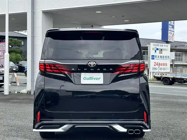 トヨタ アルファード Z 熊本県 2024(令6)年 0.5万km ブラック ワンオーナー/モデリスタフルエアロ/純正フリップダウンモニター/純正ナビ機能付きディスプレイオーディオ/【フルセグTV/Bluetooth/HDMI/Miracast】/パノラミックビューモニター/両側パワースライドドア/パワーバックドア/トヨタセーフティセンス/レーダークルーズコントロール/プリクラッシュセーフティ/レーンディパーチャーアラート/ロードサインアシスト/プロアクティブドライビングアシスト/リヤクロストラフィックアラート/ブラインドスポットモニター/後方車両接近告知機能/パーキングサポートブレーキ/リヤカメラディテクション/安心降車アシスト/周辺車両接近時サポート/クリアランスソナー/黒革シート/前席パワーシート/運転席シートメモリ/前・2列目エアーシート/シートヒーター/2列目オットマン/ステアリングヒーター/ビルトインETC2.0/ワイヤレス充電/純正18インチAW/横滑り防止機能/ブレーキホールド/オートライト/オートハイビーム/LEDヘッドライト/フォグランプ/純正フロアマット/革巻きステアリング/ステアリングスイッチ/保証書