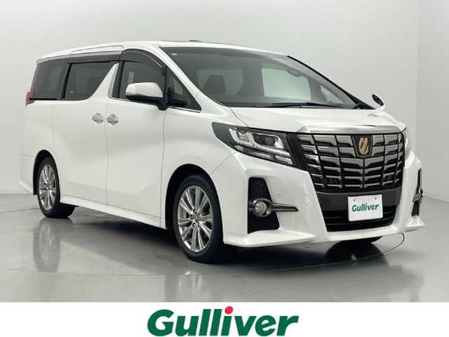 トヨタ アルファード S Aパッケージ タイプブラック 熊本県 2017(平29)年 7.3万km ホワイトパールクリスタルシャイン ツインムーンルーフ　/純正10インチナビNSZN-Z66T（ＣＤ・ＤＶＤ・フルセグ・ＢＴ）/純正12インチ後席モニター　/純正前方ドライブレコーダー　/バックカメラ/レーダークルーズコントロール/ビルトインＥＴＣ　/両側パワースライドドア　/前後クリアランスソナー　/パワーバックドア/GPSレーダー探知機/助手席・2列目オットマン/電動パーキングブレーキ/ブレーキホールド/横滑り防止/純正フロアマット/純正１８インチAW/オートライト/LEDヘッドライト/スマートキー/プッシュスタート/スペアキー1本/保証書/取扱説明書
