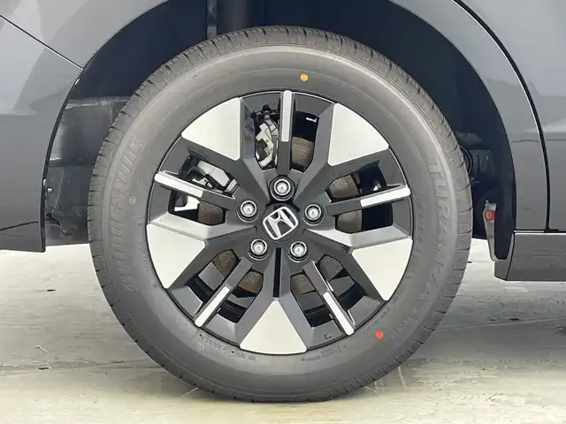 ホンダ ステップワゴン eHEV エアー EX 愛知県 2025(令7)年 0.1千km クリスタルブラックパール 登録済未使用車/純正11.4インチナビ/・フルセグ/・Bluetooth/・Apple Car Play/・Android Auto/・CD/・DVD/両側パワースライドドア/前席シートヒーター/バックカメラ/追従型クルコン/レーンキープアシスト/衝突軽減ブレーキ/コーナーセンサー/盗難防止装置/横滑り防止装置/純正アルミホイール/LEDヘッドライト/スマートキー/スペアキー/保証書/取扱説明書