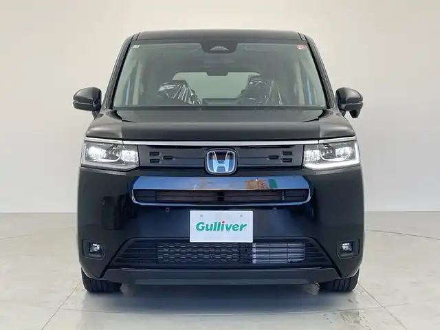 ホンダ ステップワゴン eHEV エアー EX 愛知県 2025(令7)年 0.1千km クリスタルブラックパール 登録済未使用車/純正11.4インチナビ/・フルセグ/・Bluetooth/・Apple Car Play/・Android Auto/・CD/・DVD/両側パワースライドドア/前席シートヒーター/バックカメラ/追従型クルコン/レーンキープアシスト/衝突軽減ブレーキ/コーナーセンサー/盗難防止装置/横滑り防止装置/純正アルミホイール/LEDヘッドライト/スマートキー/スペアキー/保証書/取扱説明書