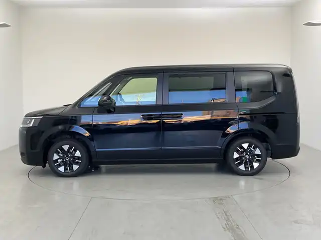 ホンダ ステップワゴン eHEV エアー EX 愛知県 2025(令7)年 0.1千km クリスタルブラックパール 登録済未使用車/純正11.4インチナビ/・フルセグ/・Bluetooth/・Apple Car Play/・Android Auto/・CD/・DVD/両側パワースライドドア/前席シートヒーター/バックカメラ/追従型クルコン/レーンキープアシスト/衝突軽減ブレーキ/コーナーセンサー/盗難防止装置/横滑り防止装置/純正アルミホイール/LEDヘッドライト/スマートキー/スペアキー/保証書/取扱説明書