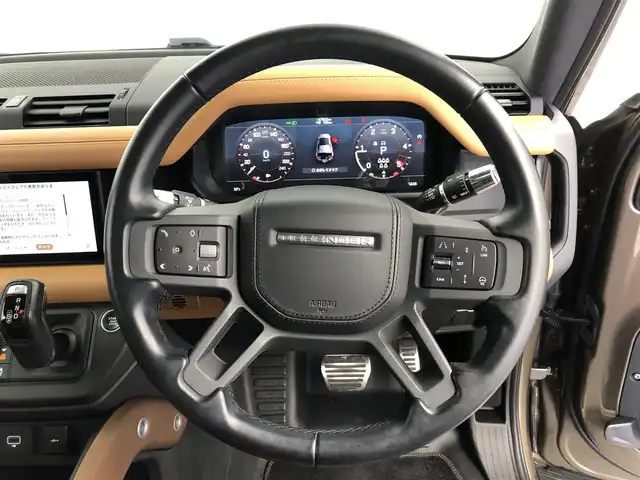 ランドローバー ランドローバー ディフェンダー XトロフィーED 愛知県 2021(令3)年 4.8万km 茶 20台限定特別仕様車/ボディーカラー「ゴンドワナストーン」/インテリアカラー「ヴィンテージタン／エボニー」/プロテクションフィルム施工済み/ワンオーナー/スライディングパノラミックルーフ/メリディアンサラウンドサウンド/コールドクライメートパック/赤キャリパー/ヘッドアップディスプレイ/置くだけ充電/デジタルインナーミラー/純正ナビ（Bluetooth/Apple CarPlay）/全方位カメラ/BSM/ACC/衝突軽減システム/レーンアシスト/コーナーセンサー/ETC2.0/パワーシート/シートヒーター/シートクーラー/メモリシート/ステアリングヒーター/ドライブレコーダー/純正AW/純正LEDライト/オートライト/ダウンヒルアシストコントロール/背面タイヤ