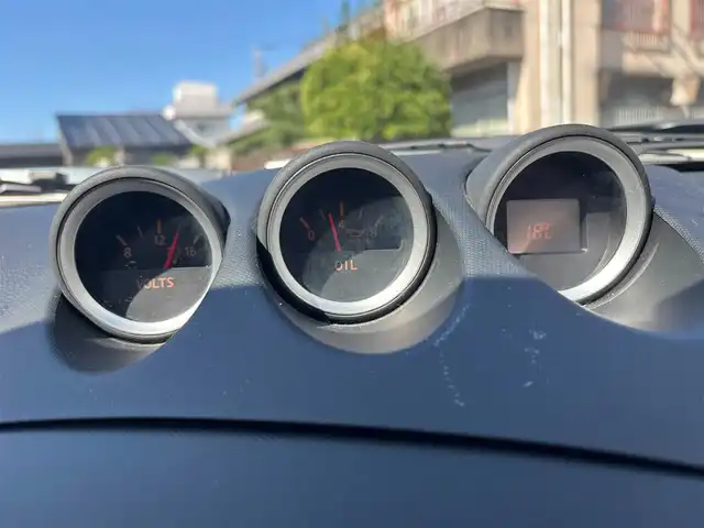 日産 フェアレディ Ｚ バージョンT 愛知県 2004(平16)年 1.8万km ホワイトパール ＢＯＳＥサウンド　７スピーカー　６ＣＤチェンジャー　ＥＴＣ　本革シート　シートヒーター　パワーシート　ＨＩＤライト　オートエアコン　純正１７インチアルミホイール　キーレスエントリー　スペアキー