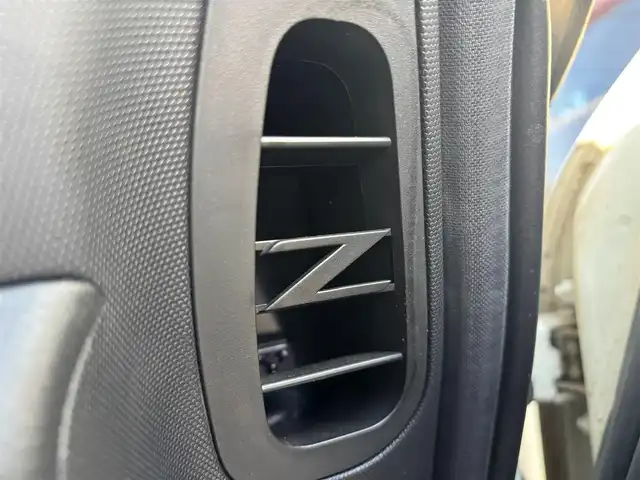 日産 フェアレディ Ｚ バージョンT 愛知県 2004(平16)年 1.8万km ホワイトパール ＢＯＳＥサウンド　７スピーカー　６ＣＤチェンジャー　ＥＴＣ　本革シート　シートヒーター　パワーシート　ＨＩＤライト　オートエアコン　純正１７インチアルミホイール　キーレスエントリー　スペアキー