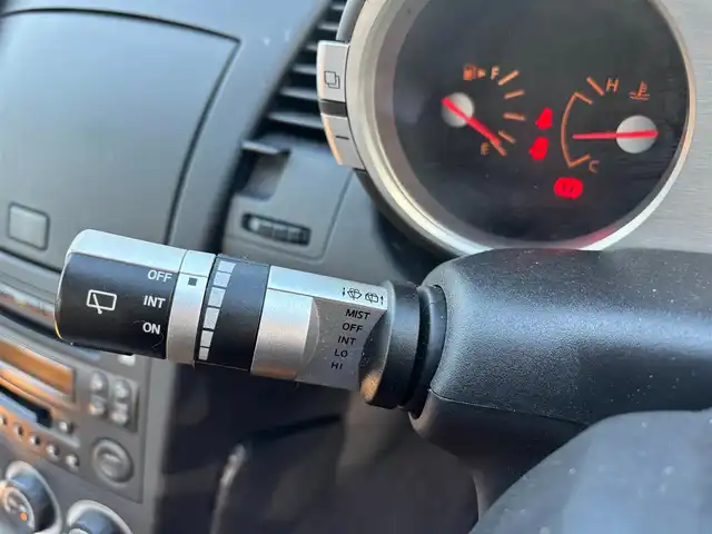 日産 フェアレディ Ｚ バージョンT 愛知県 2004(平16)年 1.8万km ホワイトパール ＢＯＳＥサウンド　７スピーカー　６ＣＤチェンジャー　ＥＴＣ　本革シート　シートヒーター　パワーシート　ＨＩＤライト　オートエアコン　純正１７インチアルミホイール　キーレスエントリー　スペアキー