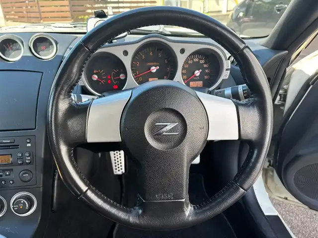 日産 フェアレディ Ｚ バージョンT 愛知県 2004(平16)年 1.8万km ホワイトパール ＢＯＳＥサウンド　７スピーカー　６ＣＤチェンジャー　ＥＴＣ　本革シート　シートヒーター　パワーシート　ＨＩＤライト　オートエアコン　純正１７インチアルミホイール　キーレスエントリー　スペアキー