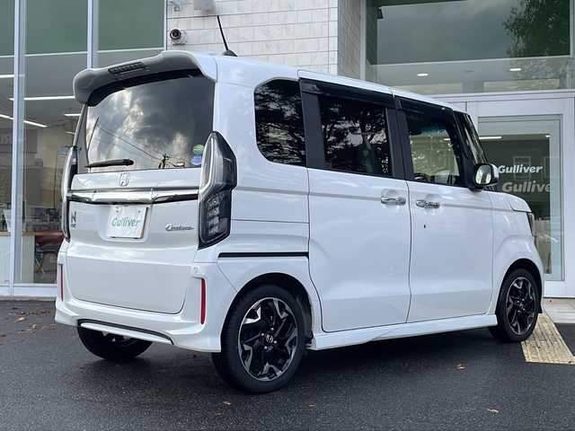 ホンダ Ｎ ＢＯＸ カスタム G L ターボ ホンダセンシング 鳥取県 2019(平31)年 4.2万km プラチナホワイトパール ホンダセンシング/Gathersナビ【VXM-194VFi】/・フルセグ/Bluetooth/CD/DVD/バックカメラ/スマートキー/プッシュスタート/ビルトインETC/ターボ/ハーフレザーシート/両側電動スライドドア/純正15AW/パドルシフト/ABS/横滑り防止装置/前後誤発信抑制機能/レーンキープアシスト/オートライト/LEDヘッドライト/W&サイドエアバック/カーテンエアバック