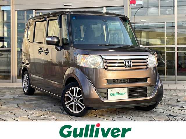 ホンダ Ｎ ＢＯＸ G SSパッケージ 静岡県 2015(平27)年 6.4万km プレミアムブロンズパール 純正ナビ/AM/FM/CD/DVD/USB/ipod/SD/Bluetooth/ワンセグTV/VTR/AUX/主要装備/・純正ナビ　/・バックカメラ　/・ドライブレコーダー　/・両側パワースライドドア　/・アイドリングストップ　/・スマートキー　/・シティーブレーキ　/・ワンオーナー　/・衝突軽減システム　/・横滑り防止装置　/・ステアリングリモコン/・取扱説明書/・保証書/・カーテンエアバック/・純正アルミホイール/・純正フロアマット