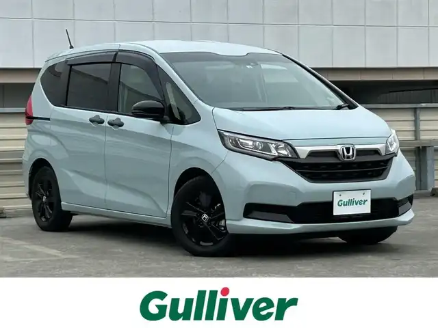 ホンダ フリード ハイブリット G ブラックスタイル 静岡県 2022(令4)年 1.6万km フィヨルドミストパール ホンダセンシング/純正９型ＳＤナビ/フルセグＴＶ/ＤＶＤ再生/ＢＴオーディオ/ＡＣＣ/バックカメラ/前後ドラレコ/両側電動スライドドア/ビルトインＥＴＣ２．０/ＬＥＤヘッドライト/前席シートヒーター/専用１５ＡＷ