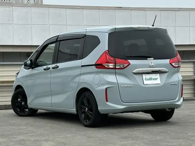 ホンダ フリード ハイブリット G ブラックスタイル 静岡県 2022(令4)年 1.6万km フィヨルドミストパール ホンダセンシング/純正９型ＳＤナビ/フルセグＴＶ/ＤＶＤ再生/ＢＴオーディオ/ＡＣＣ/バックカメラ/前後ドラレコ/両側電動スライドドア/ビルトインＥＴＣ２．０/ＬＥＤヘッドライト/前席シートヒーター/専用１５ＡＷ