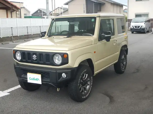 スズキ ジムニー XC 静岡県 2021(令3)年 4.2万km シフォンアイボリーM ワンオーナー/新車保証書/デュアルセンサーブレーキサポート/車線逸脱警報/パートタイム4WD/・高低二段切り替え式（後輪駆動ベース）/スマートキー×2/プッシュスタート/インタークーラーターボエンジン/ヘッドライトウォッシャー/オートライト/社外フロアマット/バックカメラ（本体のみ）/背面タイヤ/TOYO TIRES オープンカントリーR/T/前席シートヒーター/ウインカー付きドアミラー/新車保証書/取り扱い説明書