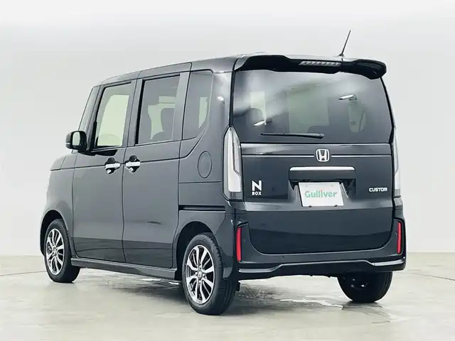 ホンダ Ｎ ＢＯＸ カスタム 福島県 2023(令5)年 0.1万km未満 クリスタルブラックパール ホンダセンシング/・衝突軽減ブレーキ/・路外逸脱抑制機能/・レーダークルーズコントロール/・踏み間違い防止装置/・車線逸脱警報/・パーキングセンサー/電子パーキングブレーキ/・ブレーキオートホールド/ステアリングリモコン/運転席＋助手席シートヒーター/左側パワースライドドア/LEDヘッドライト/・オートライト/純正14インチアルミホイール/電動格納ミラー/プッシュスタート/・スマートキー
