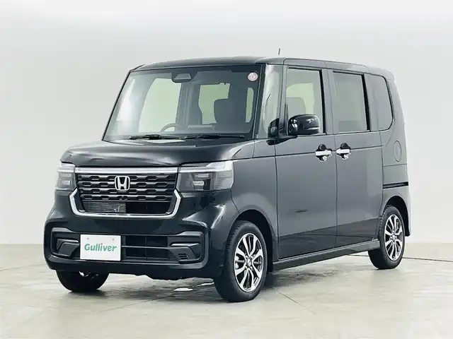 ホンダ Ｎ ＢＯＸ カスタム 福島県 2023(令5)年 0.1万km未満 クリスタルブラックパール ホンダセンシング/・衝突軽減ブレーキ/・路外逸脱抑制機能/・レーダークルーズコントロール/・踏み間違い防止装置/・車線逸脱警報/・パーキングセンサー/電子パーキングブレーキ/・ブレーキオートホールド/ステアリングリモコン/運転席＋助手席シートヒーター/左側パワースライドドア/LEDヘッドライト/・オートライト/純正14インチアルミホイール/電動格納ミラー/プッシュスタート/・スマートキー