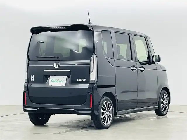 ホンダ Ｎ ＢＯＸ カスタム 福島県 2023(令5)年 0.1万km未満 クリスタルブラックパール ホンダセンシング/・衝突軽減ブレーキ/・路外逸脱抑制機能/・レーダークルーズコントロール/・踏み間違い防止装置/・車線逸脱警報/・パーキングセンサー/電子パーキングブレーキ/・ブレーキオートホールド/ステアリングリモコン/運転席＋助手席シートヒーター/左側パワースライドドア/LEDヘッドライト/・オートライト/純正14インチアルミホイール/電動格納ミラー/プッシュスタート/・スマートキー