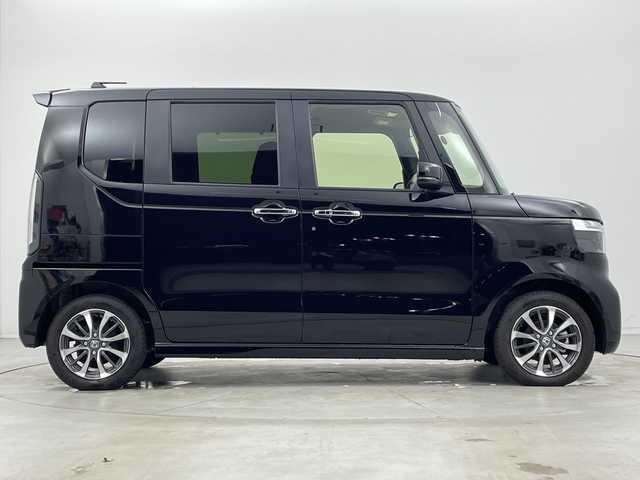 ホンダ Ｎ ＢＯＸ カスタム 新潟県 2023(令5)年 0.1千km クリスタルブラックパール ホンダセンシング/・衝突軽減ブレーキ/・路外逸脱抑制機能/・レーダークルーズコントロール/・踏み間違い防止装置/・車線逸脱警報/・パーキングセンサー/電子パーキングブレーキ/・ブレーキオートホールド/ステアリングリモコン/運転席＋助手席シートヒーター/左側パワースライドドア/LEDヘッドライト/・オートライト/純正14インチアルミホイール/電動格納ミラー/プッシュスタート/・スマートキー