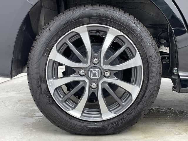 ホンダ Ｎ ＢＯＸ カスタム 新潟県 2023(令5)年 0.1千km クリスタルブラックパール ホンダセンシング/・衝突軽減ブレーキ/・路外逸脱抑制機能/・レーダークルーズコントロール/・踏み間違い防止装置/・車線逸脱警報/・パーキングセンサー/電子パーキングブレーキ/・ブレーキオートホールド/ステアリングリモコン/運転席＋助手席シートヒーター/左側パワースライドドア/LEDヘッドライト/・オートライト/純正14インチアルミホイール/電動格納ミラー/プッシュスタート/・スマートキー