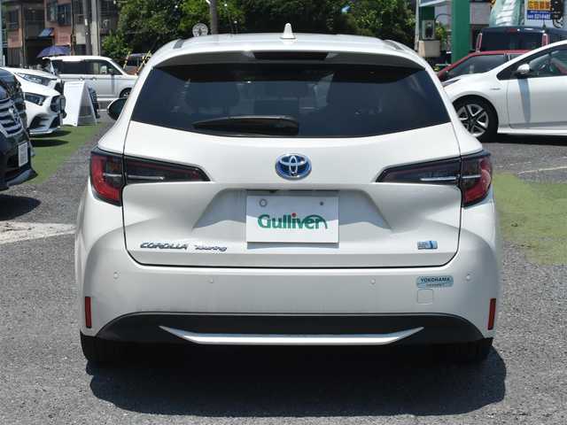 トヨタ カローラツーリング ハイブリッド S 神奈川県 2021(令3)年 1.8万km ホワイトパールクリスタルシャイン ワンオーナー/純正メモリナビ/フルセグテレビ/バックカメラ/アダプティブクルーズ/プッシュスタート/スマートキー/ETC2.0/LEDヘッドライト/スペアスマートキー/保証書/取説/ナビ説/記録(R.4.5.6)