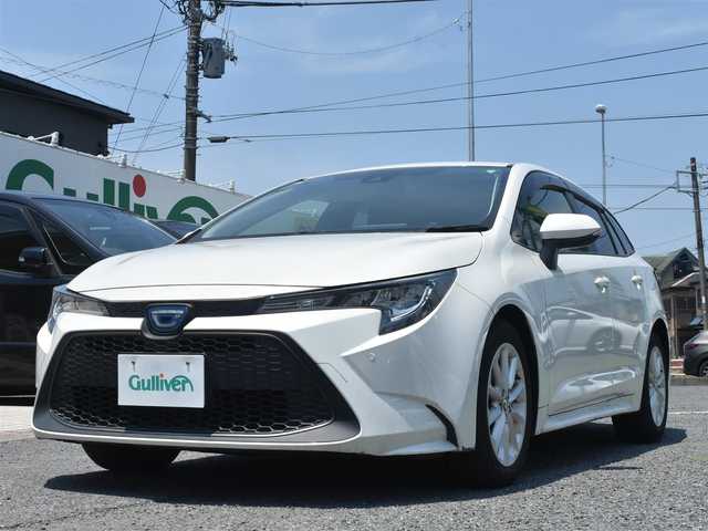 トヨタ カローラツーリング ハイブリッド S 神奈川県 2021(令3)年 1.8万km ホワイトパールクリスタルシャイン ワンオーナー/純正メモリナビ/フルセグテレビ/バックカメラ/アダプティブクルーズ/プッシュスタート/スマートキー/ETC2.0/LEDヘッドライト/スペアスマートキー/保証書/取説/ナビ説/記録(R.4.5.6)
